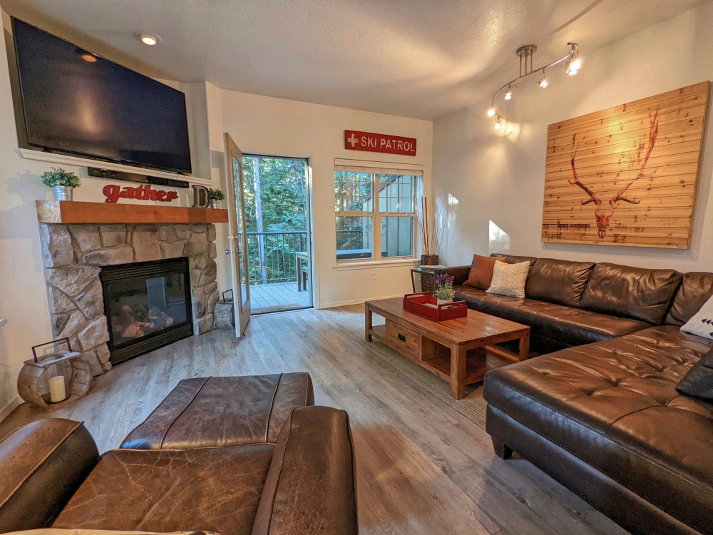 Collins Lake Condo Living Room with Fireplace