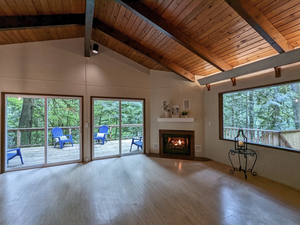 Vaulted Ceilings and Fireplace in this Hackett Creek Cedar Chalet