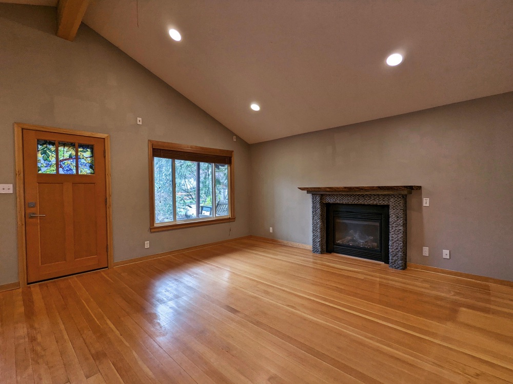 Hardwood floors and fireplace in living room of Timberline Rim Two Bedroom