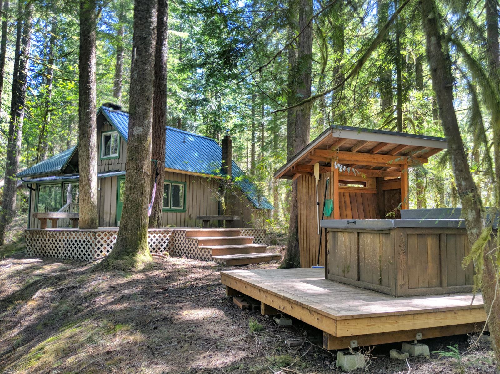 Hot tub at a Zig Zag Riverfront Cabin