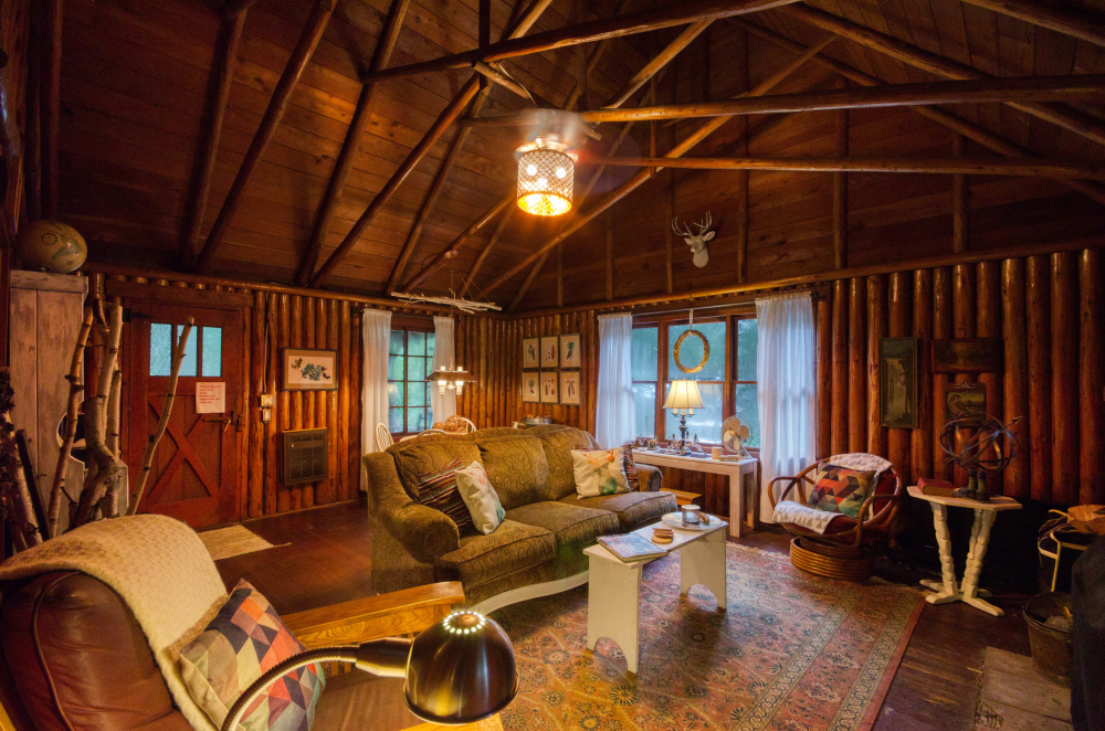 Steiner log cabin living room with one bedroom and a loft